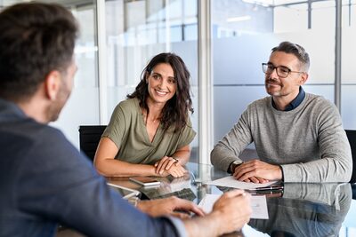 small business owners in planning meeting with advisor